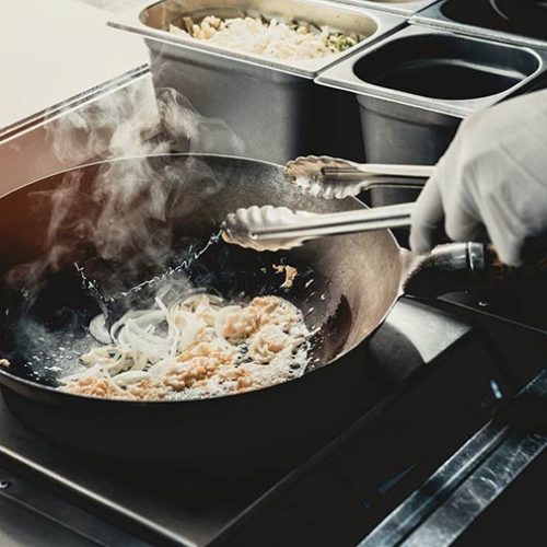 bigstock-Close-Up-Worker-Cooking-Tasty-267971764.jpg